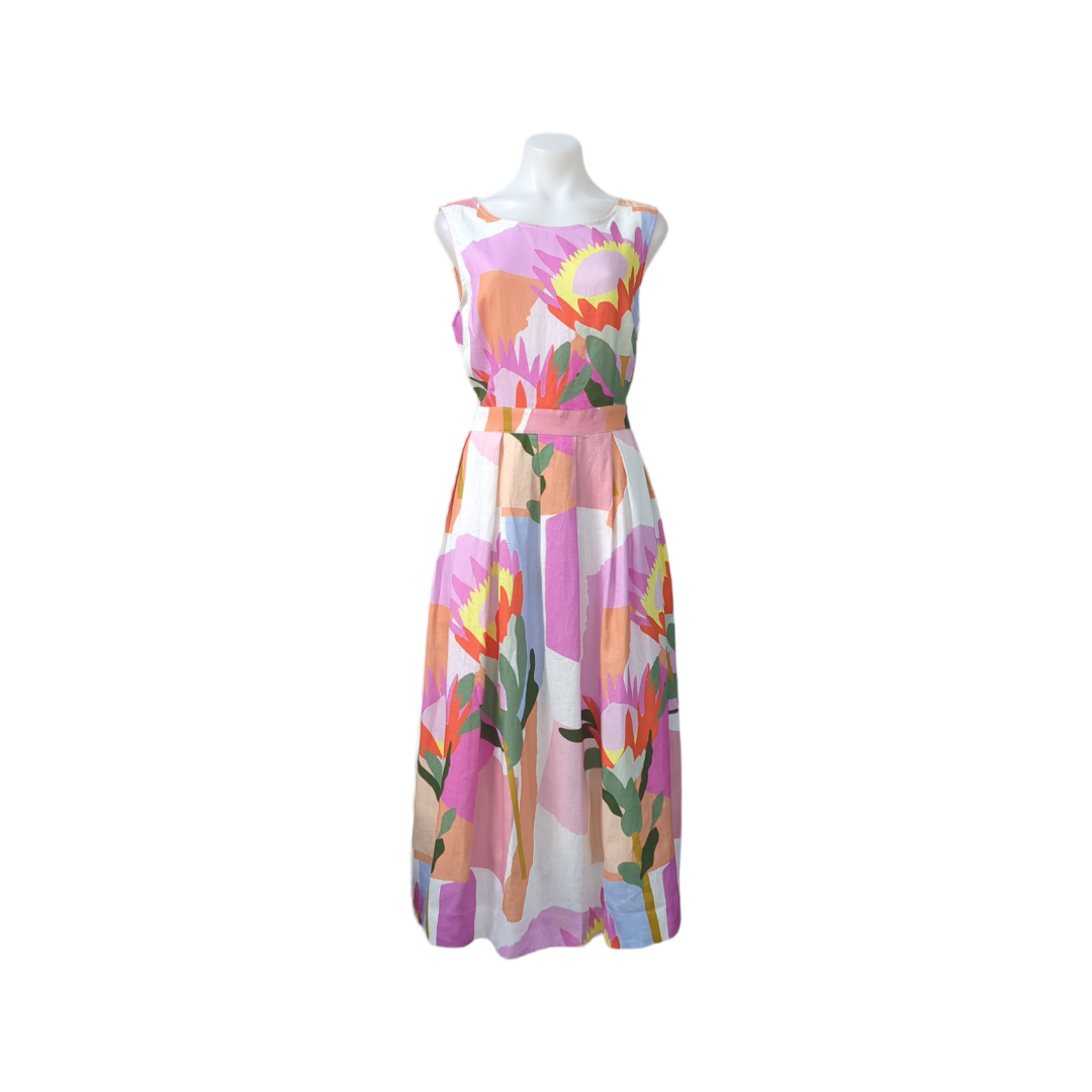 Printed Pleated Midi Dress: A Stylish and Versatile Wardrobe Essential